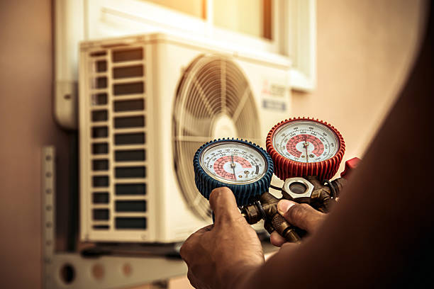 Professional Hvac technician working in Rougemont, NC